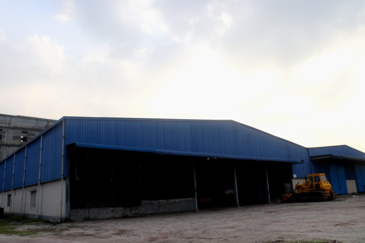Completed open-sided industrial steel shed built by SteelCraft PEB