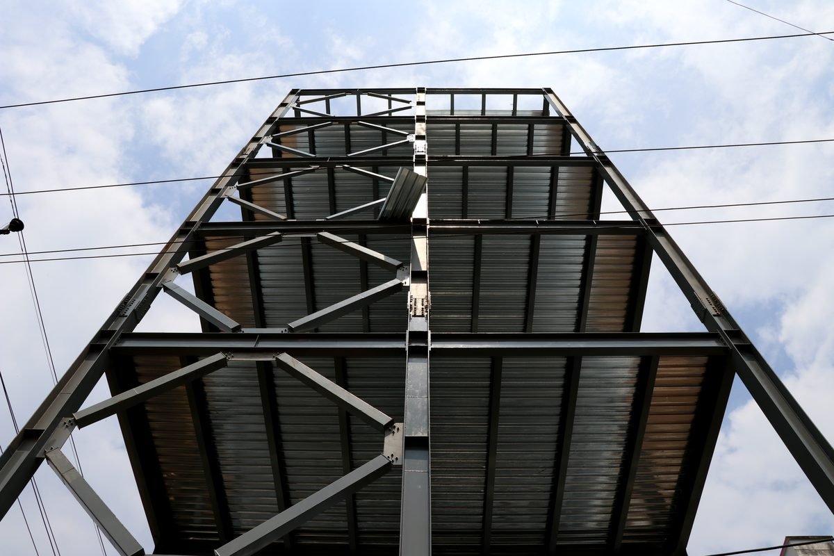 Steel roof framing and metal decking of a SteelCraft pre-engineered building seen from below